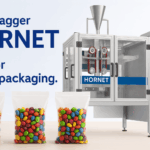 Vertobagger Hornet candy packaging machine with colorful pillow bags of candy on display, built for efficient candy packaging.