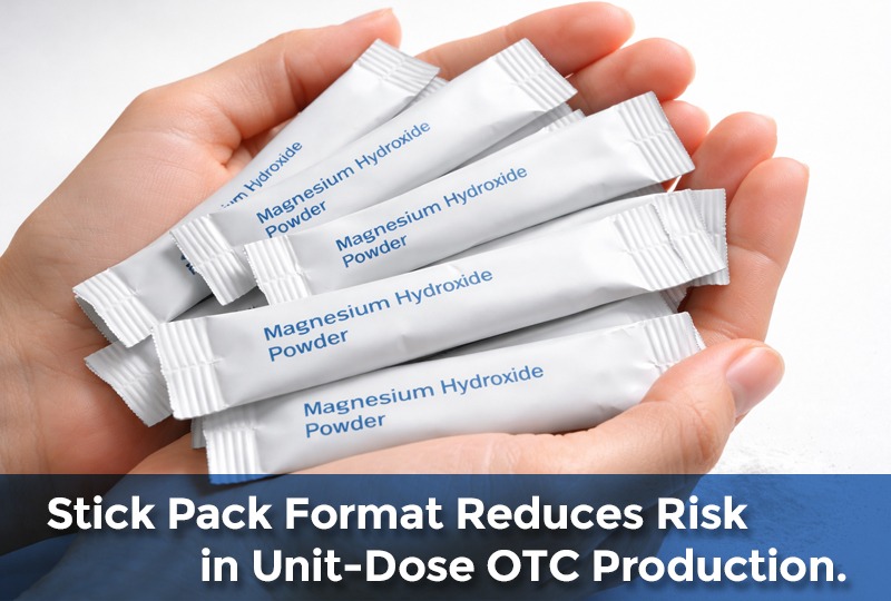 Magnesium Hydroxide stick pack packaging in hand with single-dose powder